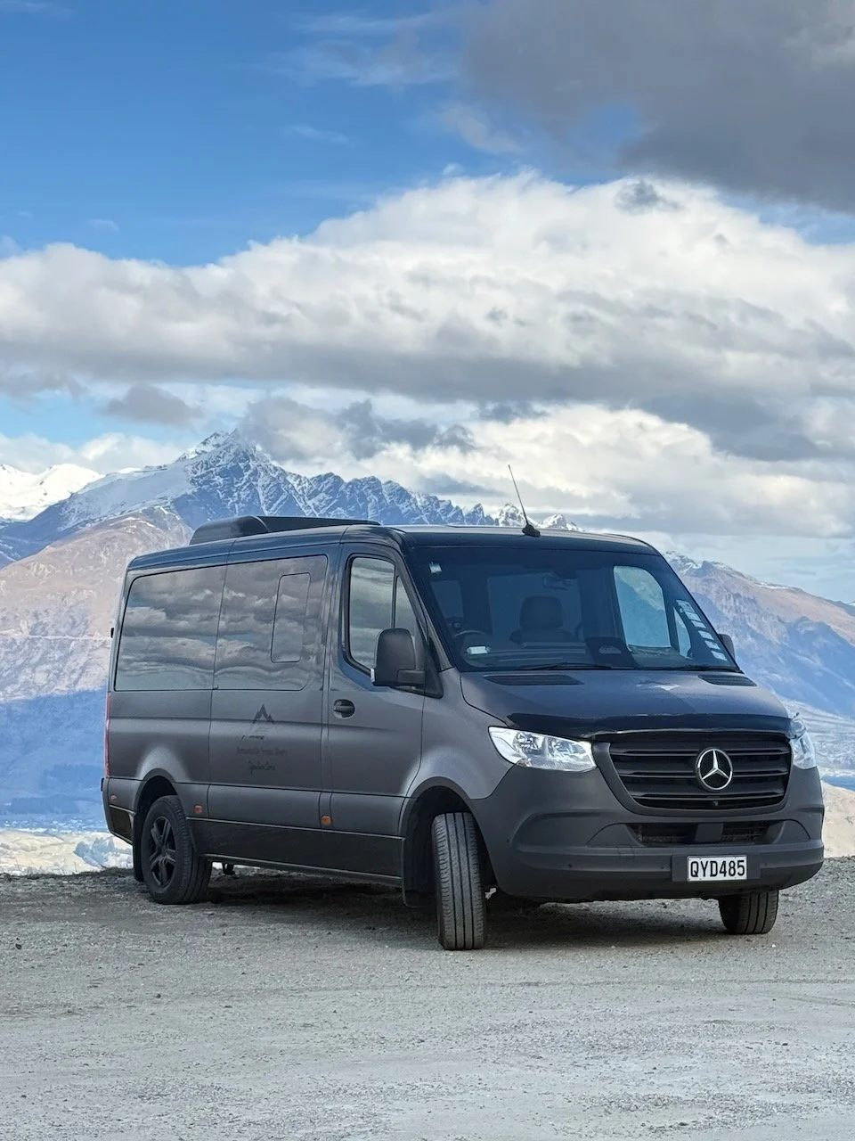 Mercedes Sprinter Signature Series Tour van parked at Coronet Peak