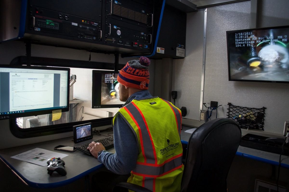 Spectrum employee using CCTV for underground video inspection