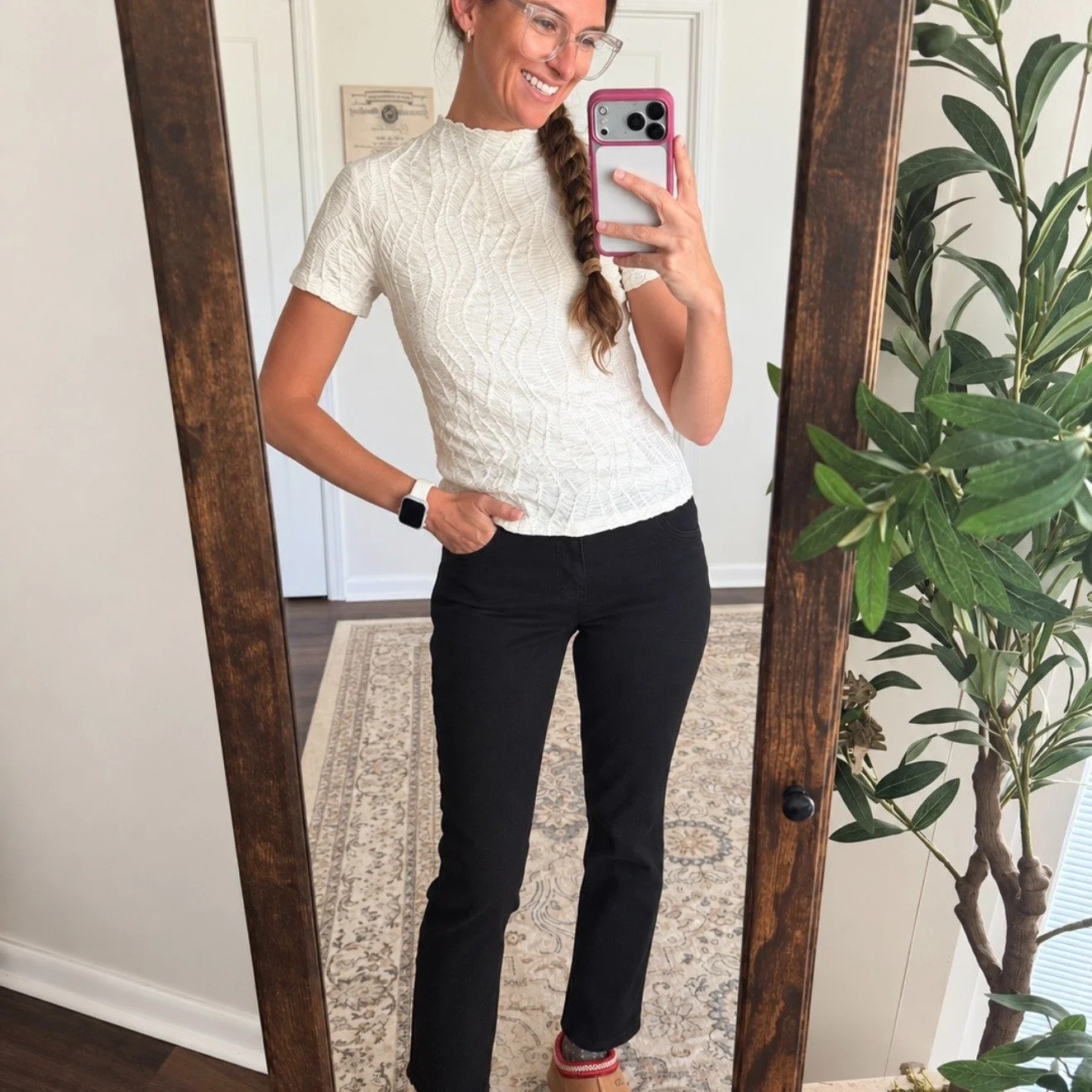 The cutest mix of polished and cozy 🤎 This textured mock-neck top looks so good with simple black jeans, and the floral lace-trim socks add the sweetest little detail with my UGGs! It&rsquo;s such an easy fall outfit that still feels completely put 