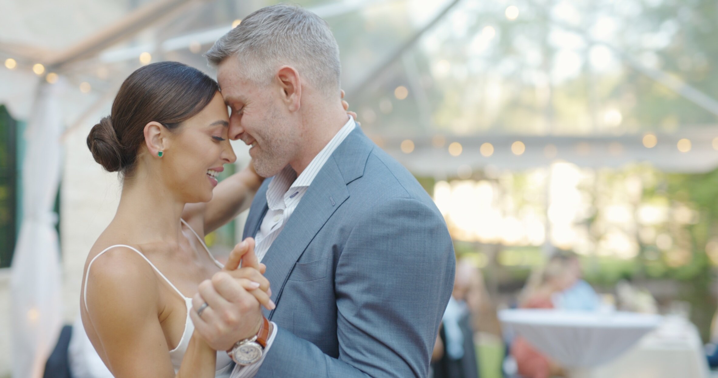 Bride and groom sharing a close, tender moment at a wedding film still, Greenville SC