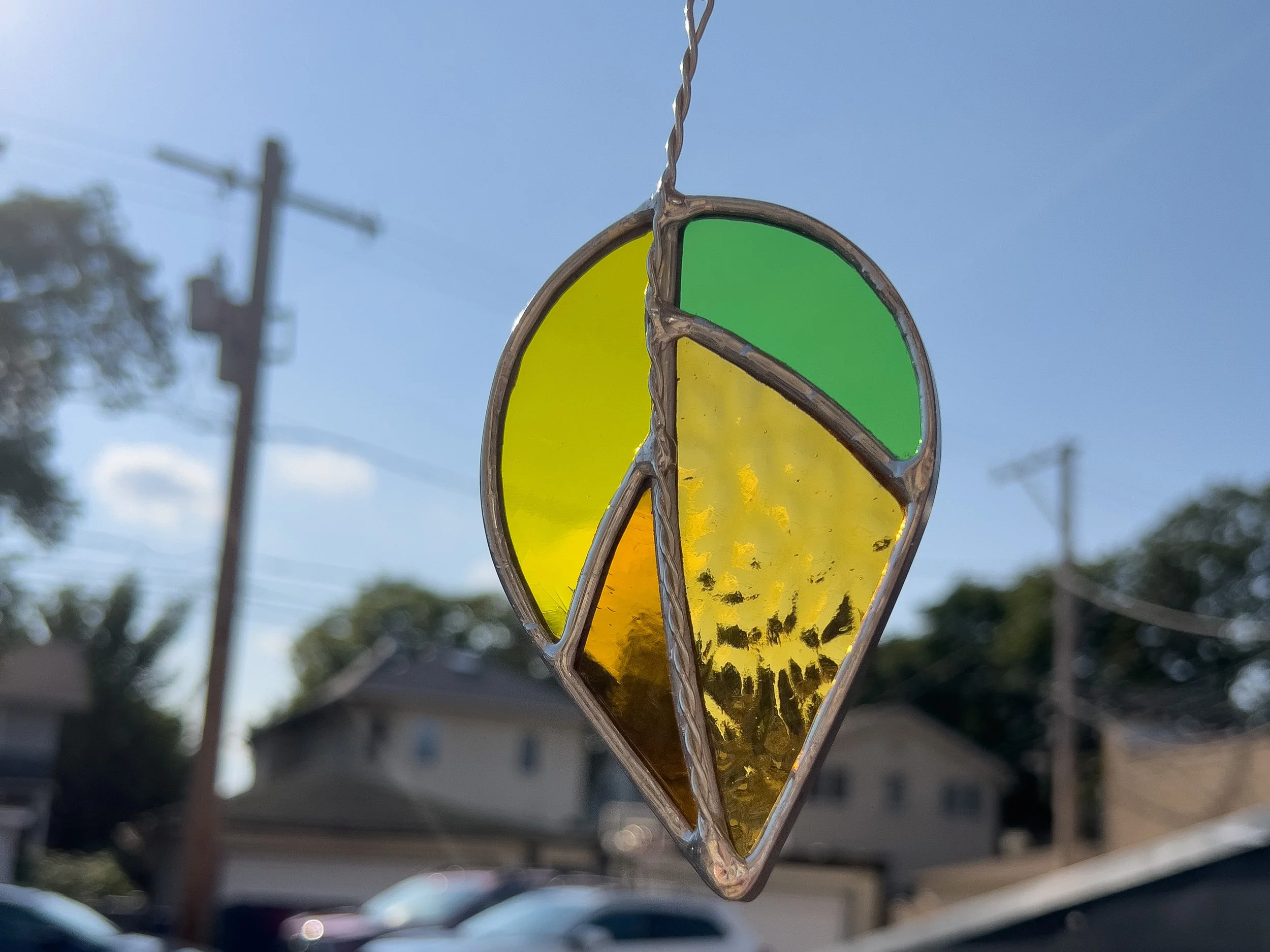 Stained glass copper foil and solder fall leaf in Oak Park introductory glass in a flash class for beginners