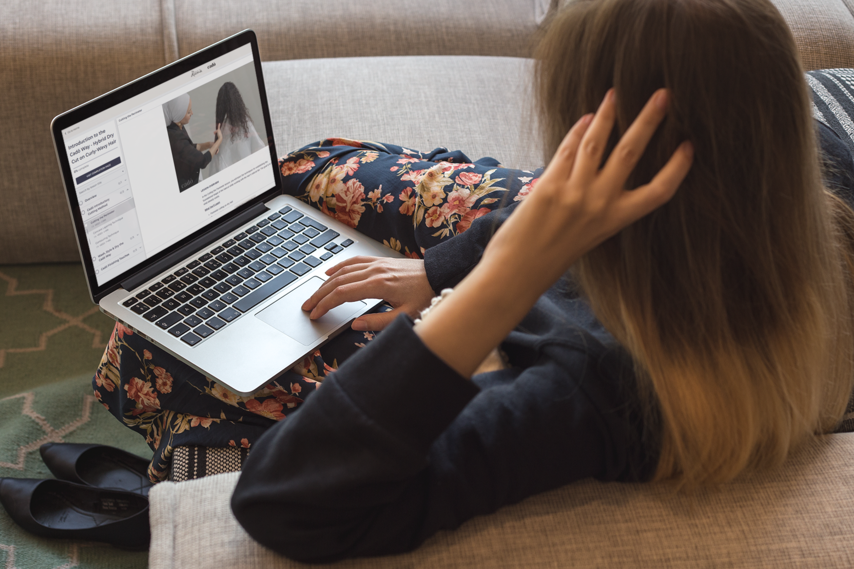 macbook-mockup-of-a-woman-working-on-a-sofa-a21507.png