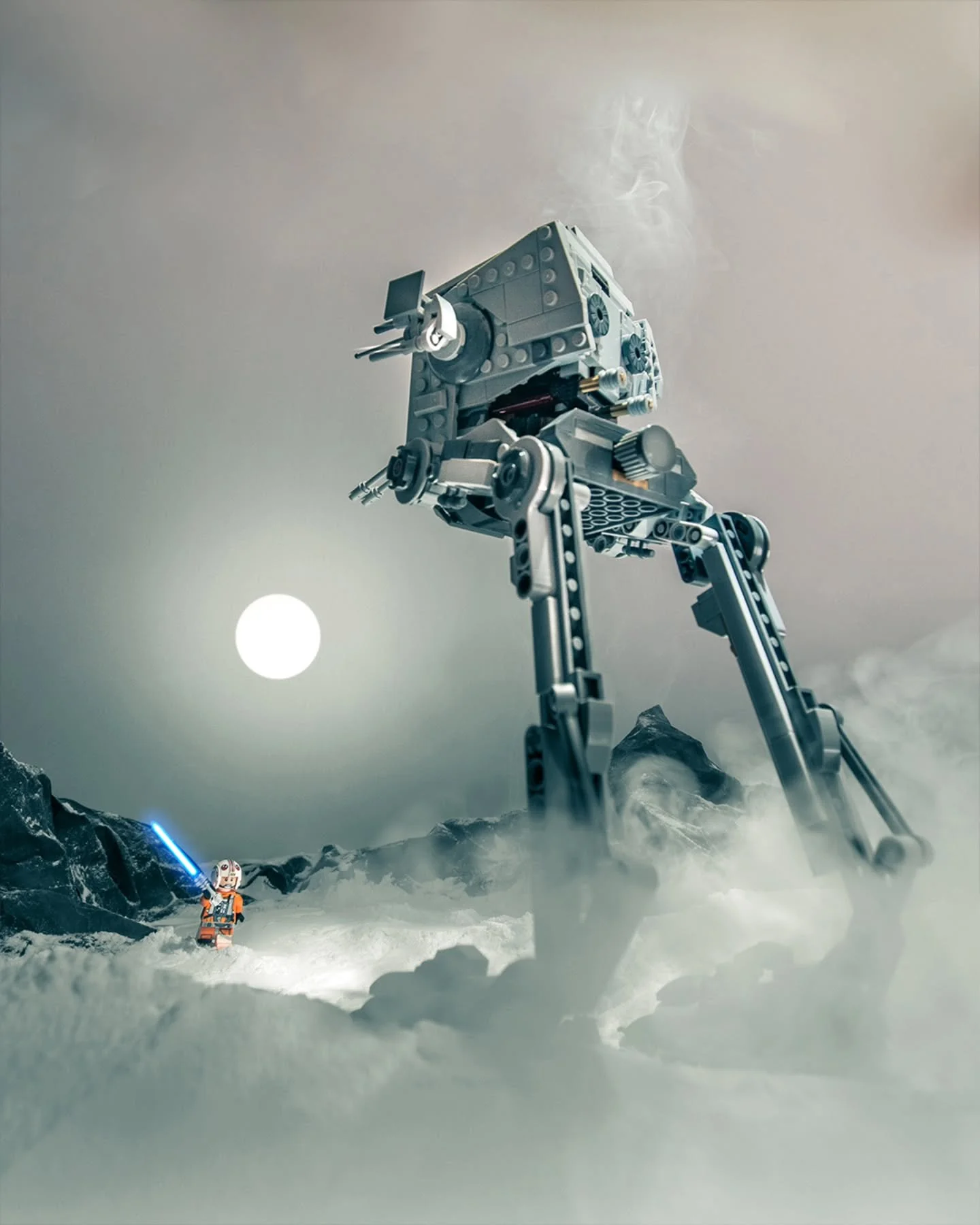 Practical shot of Luke vs AT-ST. I shot this as part of a series for Lego a few years ago. I was really proud of the mountains made from construction paper which look miles away but are really right behind the minifig. The icy fog was created with a 