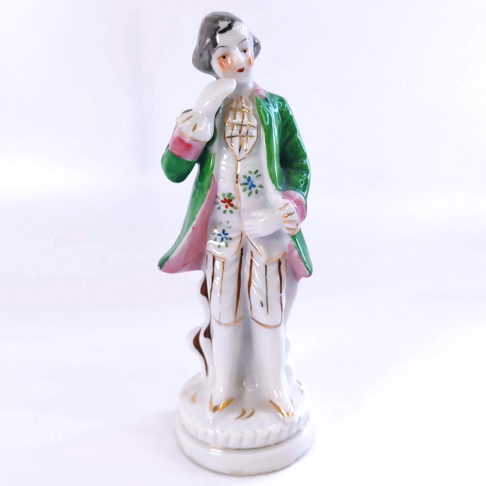 A large unusual vintage ceramic figure of an English gentleman tipping his hat