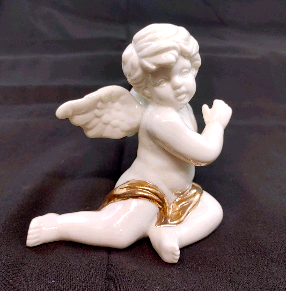 Vintage Porcelain Seated Cherub Angel Figurine High Gloss White Gold Sash 4"