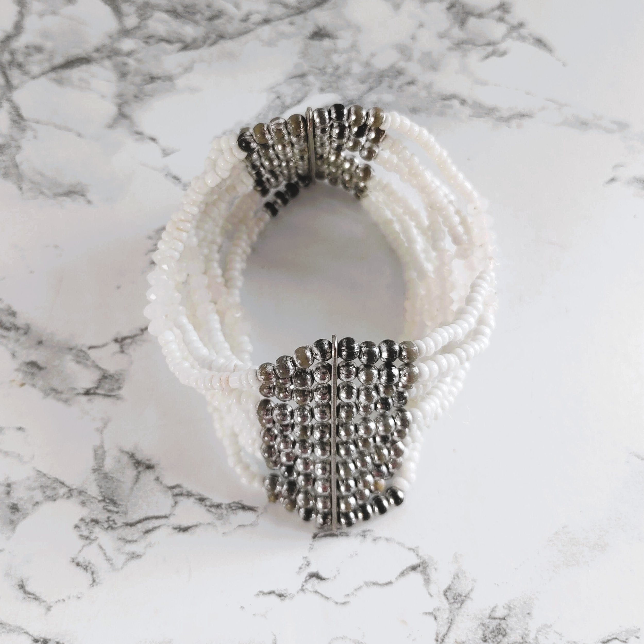 Vintage 10 Strand White and Silver-tone Seed Bead Stretch Bracelet