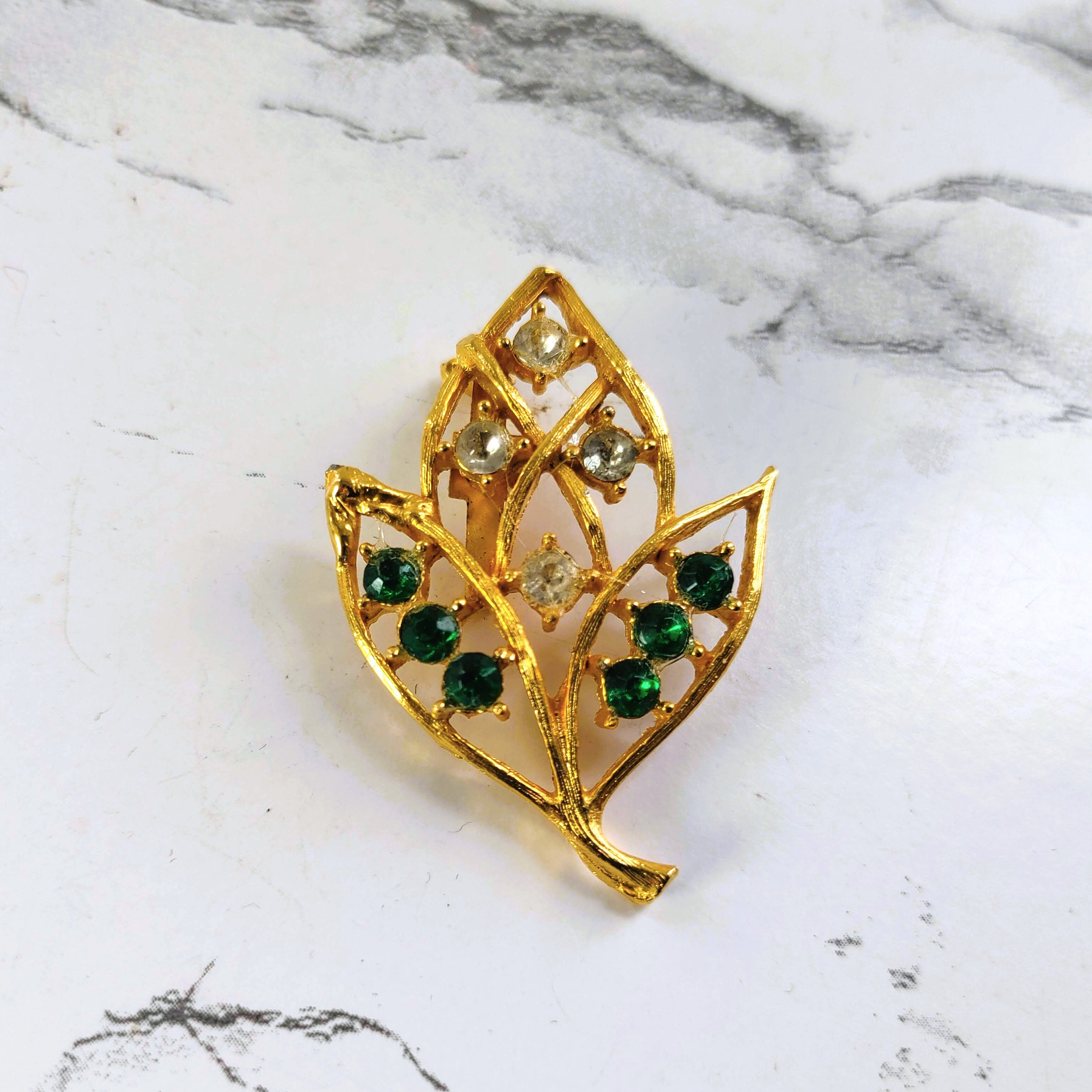 Vintage Gold-Tone Leaf Brooch with Clear and Green Rhinestones