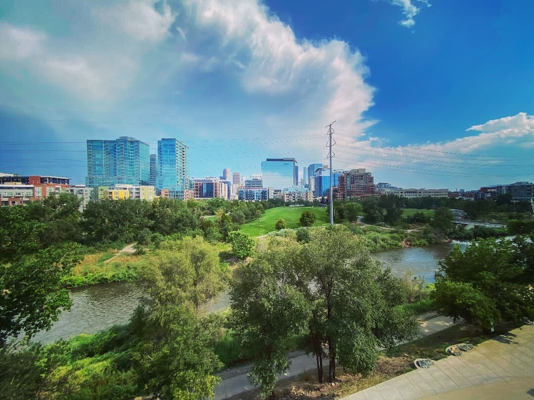 We love the view of the South Platte River and the Denver skyline from the rooftop deck at our new location! We are pleased to share that after four years in the Ballpark neighborhood near Coors Field, our Denver, Colorado office has moved to Galvani