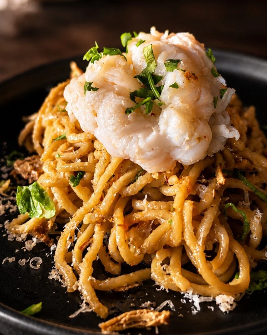 Have you tried out our new Lobster Garlic Noodles yet? Back by popular demand, our super garlicky saut&eacute;ed egg noodles features 4oz of seared lobster tail topped with crispy shallots and freshly grated parmesan. #garlicnoodles