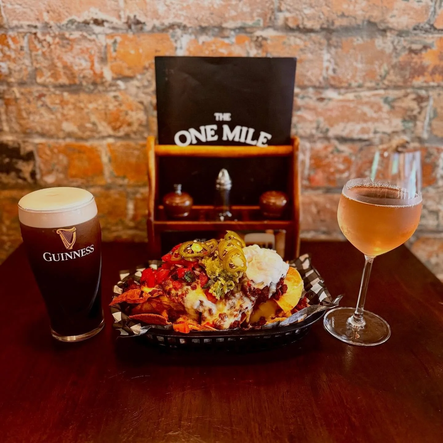 What better way to spend the afternoon than with friends, family or your significant other, sharing our deliciously stacked Nachos. Coupled with a beverage or two of course!! 🍷