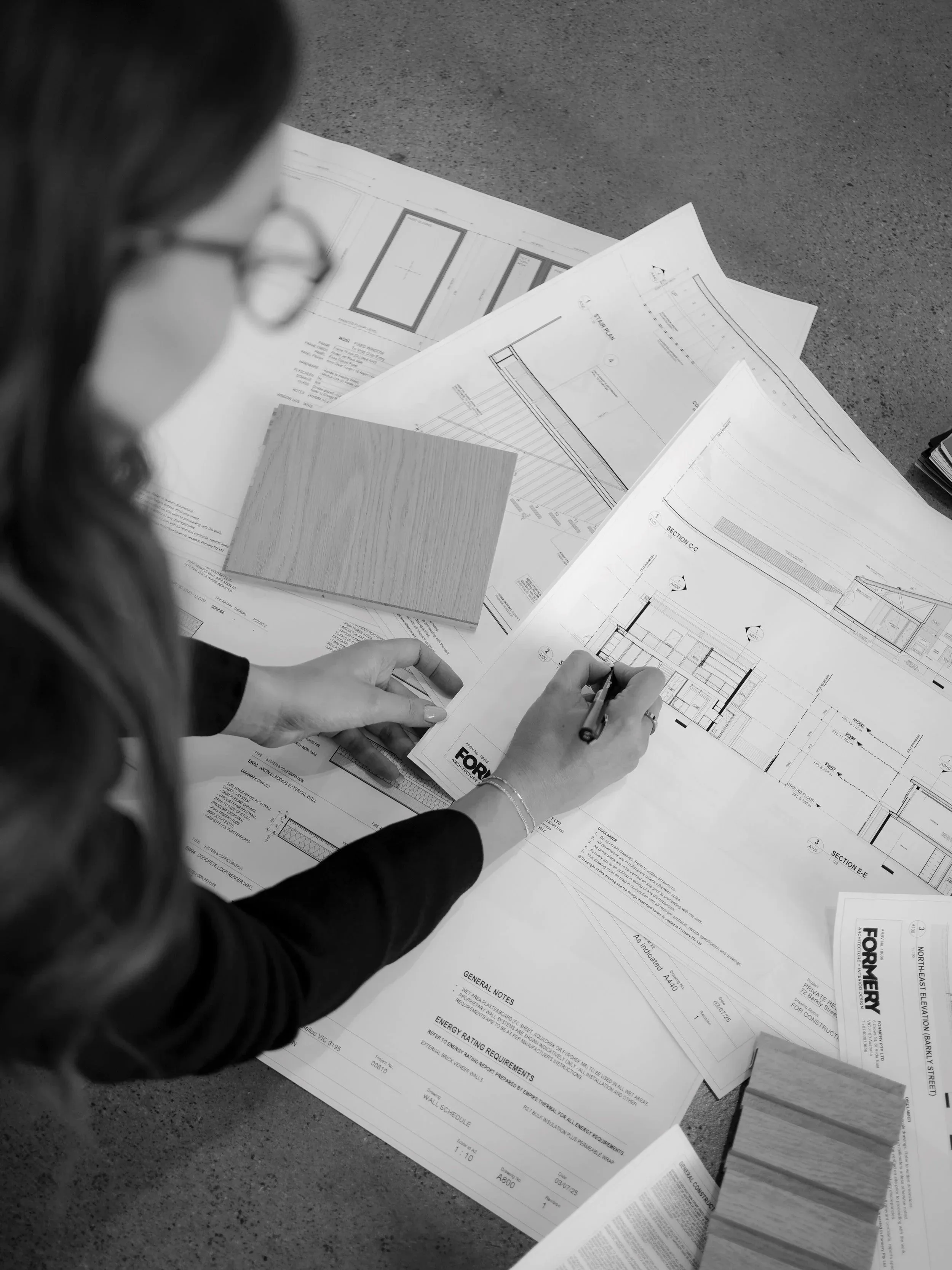Melbourne architect drawing a floorplan of a custom home design