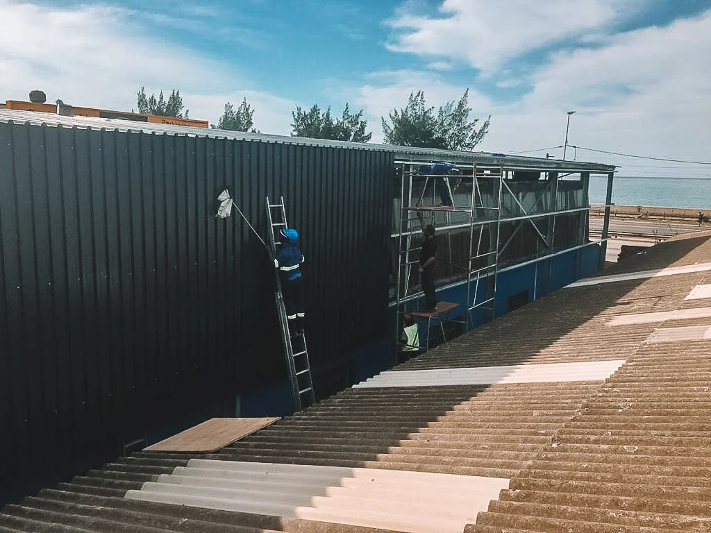 CPD - Construction of a steel-framed warehouse over an existing structure.