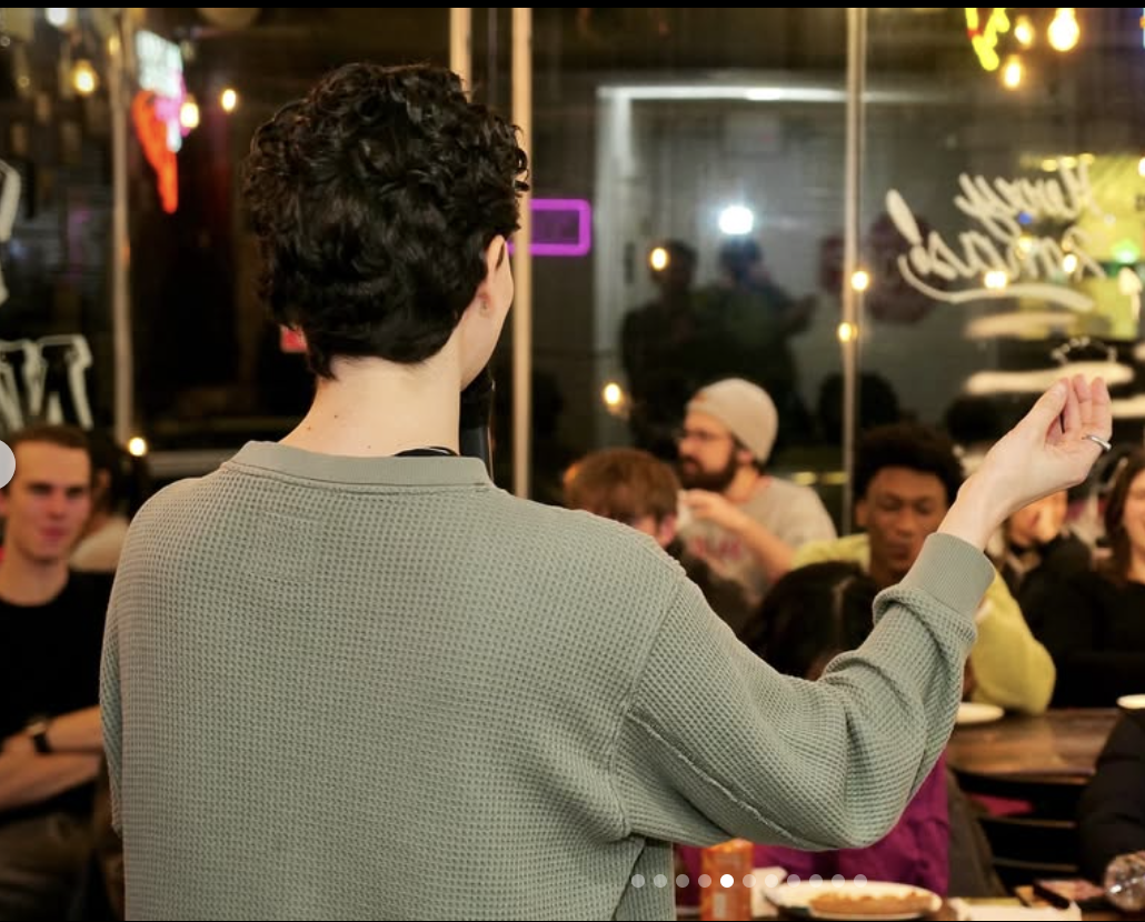 Freddie Shanel leading the audience in prayer!