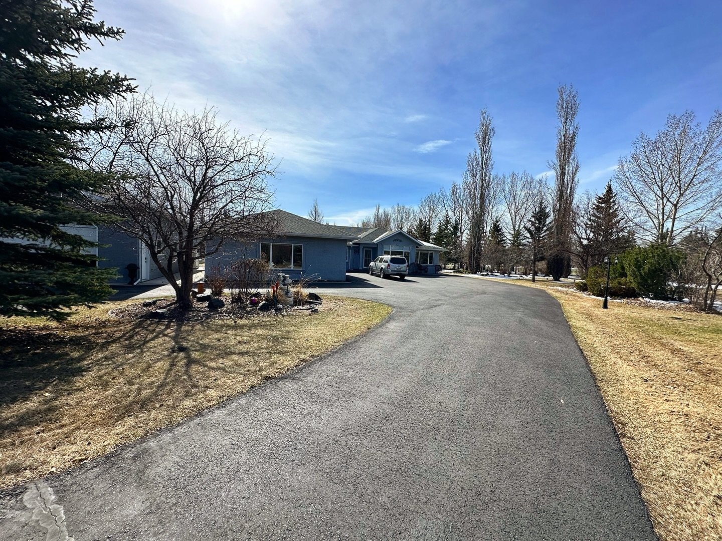 Silvertip drive, just at the south tip of Okotoks is the location for this amazing acreage!

Such a beautiful yard! With backyard retreat, two large size garages, a gym. Such a unique property! Amazing privacy, you feel you are away from it all! 

I 