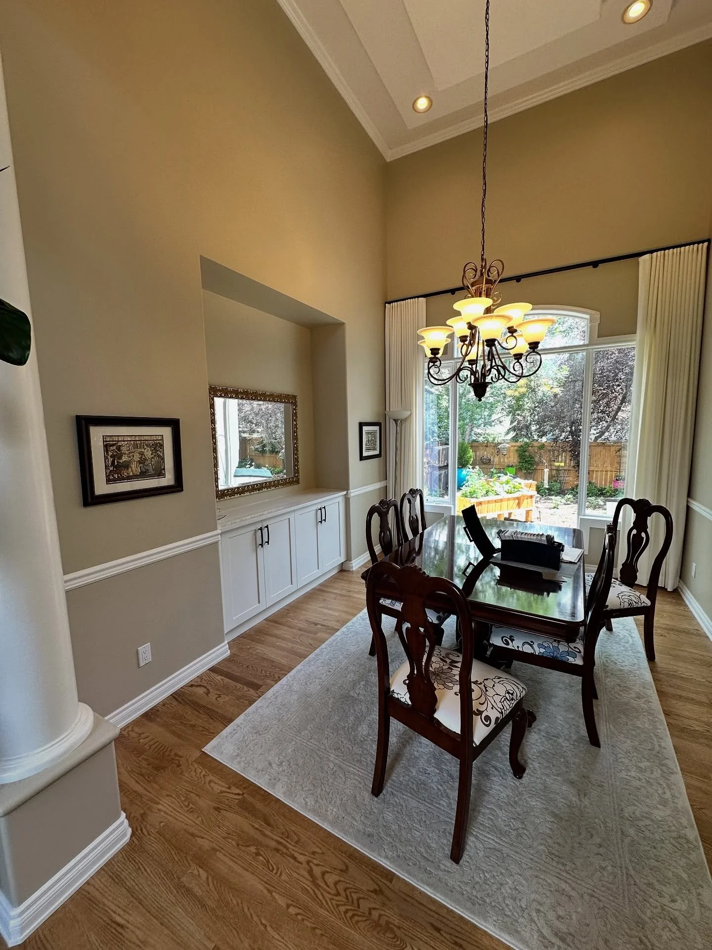 Before and after paint

The formal living and dining lacked atmosphere and definition. When rooms are open to above, it all feels the same

By adding a darker tone to the niche and base of the wall, we created comfort, interest, and a spot where the 