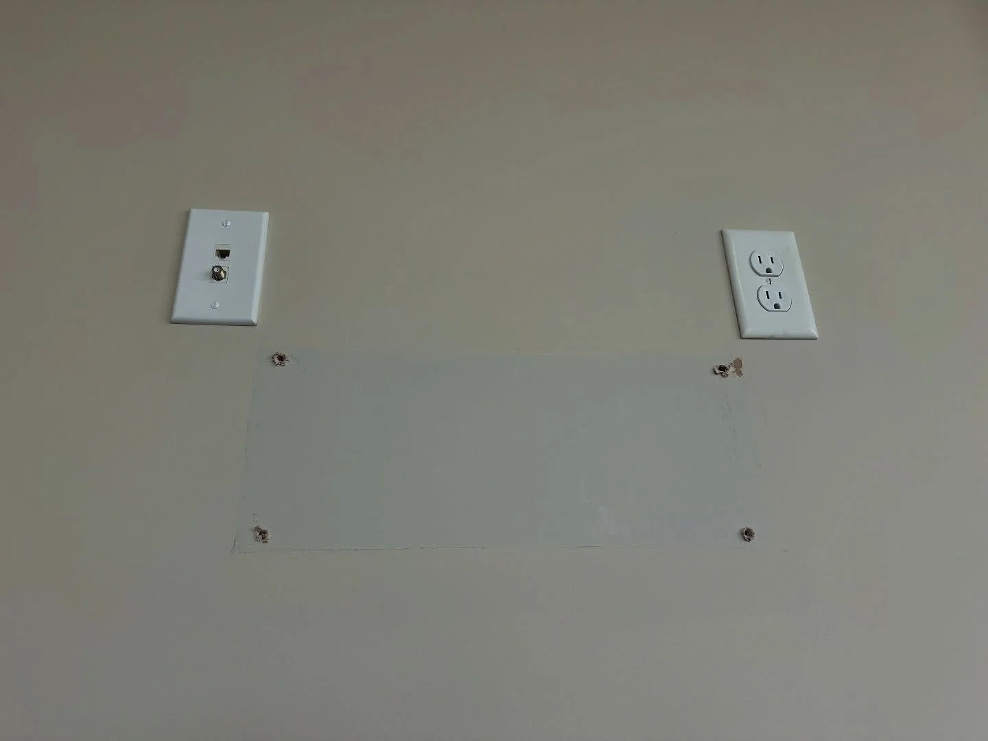 Spooky situation

The new owner of this house realized the previous owner painted around ALL the artwork. Leaving her with squares all over the house (that&rsquo;s dedication) 

This was never noticed or mentioned resulting in a repaint of the entire