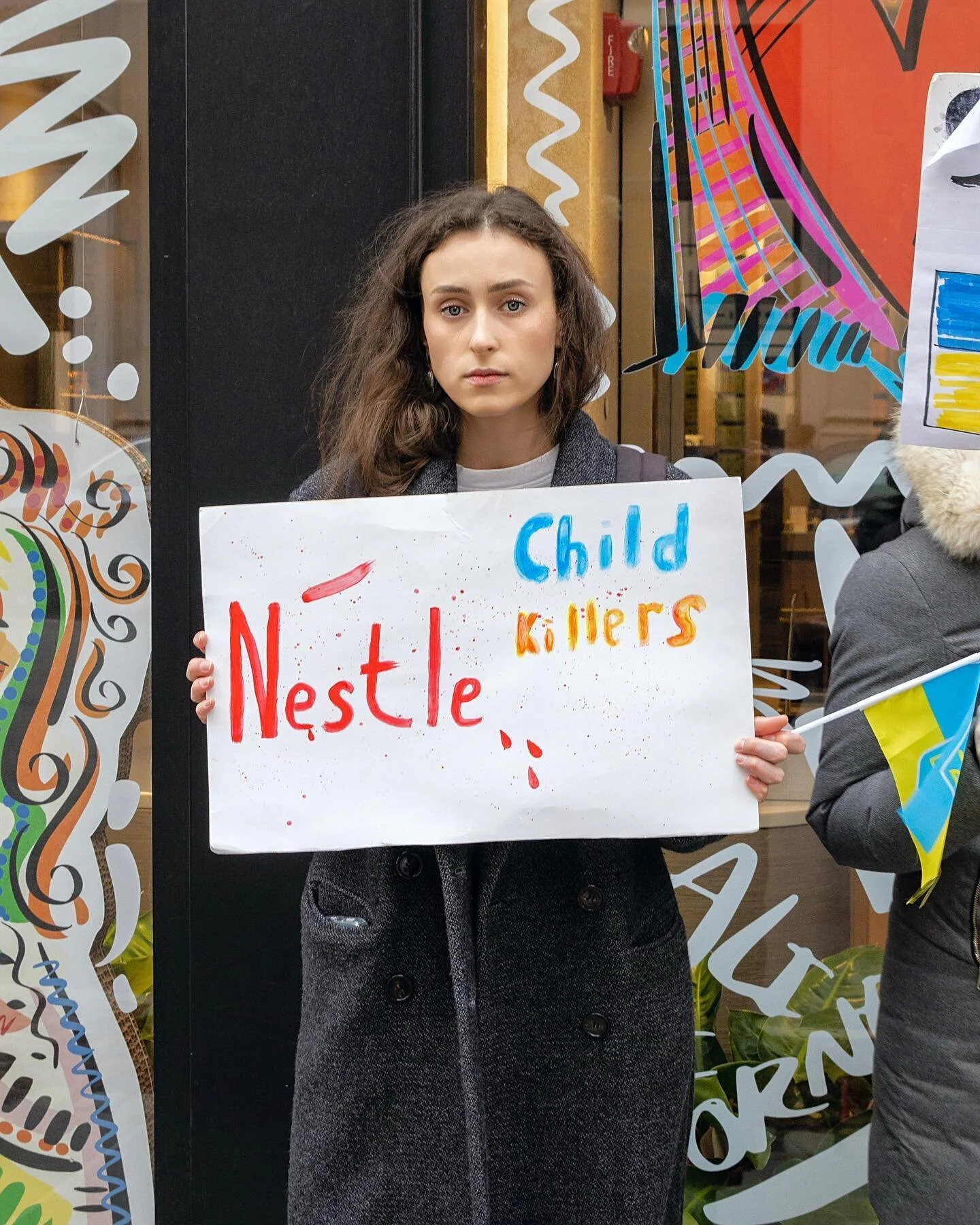 I met Elizabeth and her friends protesting outside the Nespresso Boutique on Madison Ave. Elizabeth is Ukrainian and says that Nestle is still operating in Russia and funding Putin&rsquo;s war. I did find a statement from Nestle on the topic. #street