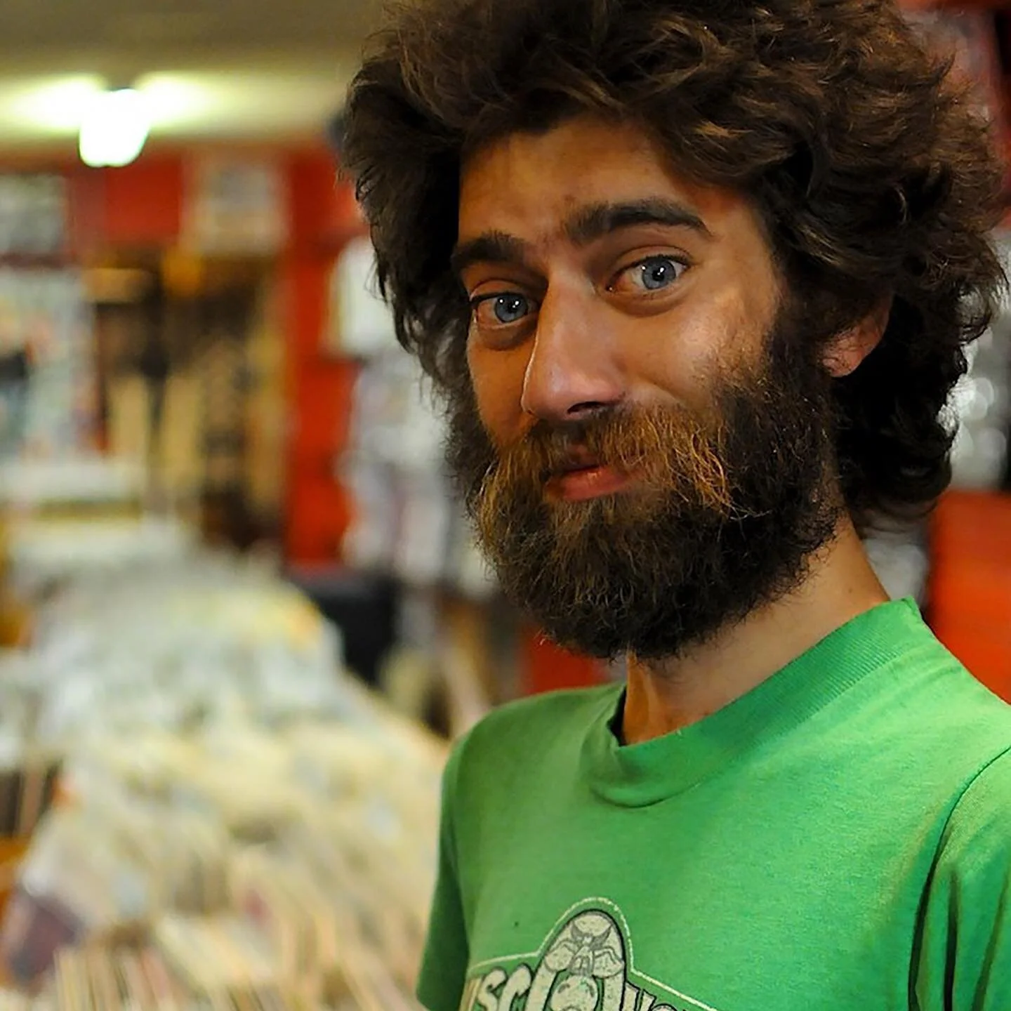 I officially started by 100 Portraits with this photograph in 2008, wandering into a vintage record store in the Adams Morgan neighborhood of Washington, DC. He described himself as a music nerd. That&rsquo;s a title I can connect with.

#streetportr