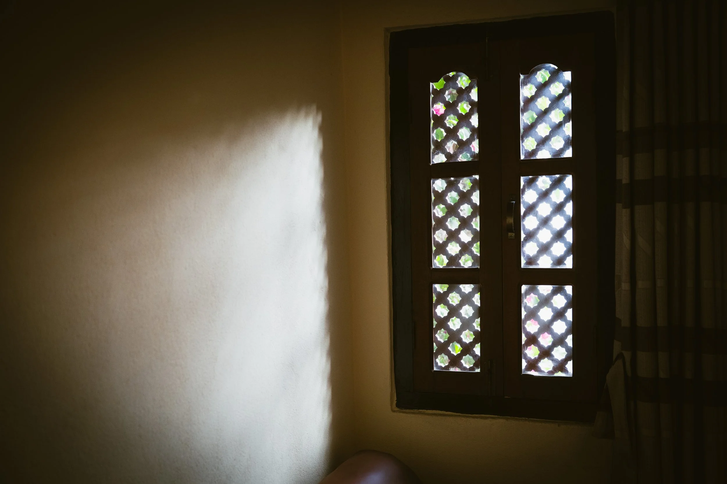 The morning sun coming through a Nepalese window