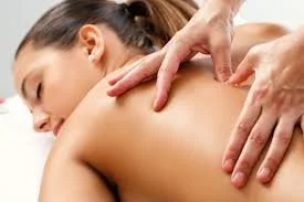 Therapist applying precise neuromuscular massage pressure to target muscle trigger points at Blue Sky Massage at Blue Sky Massage