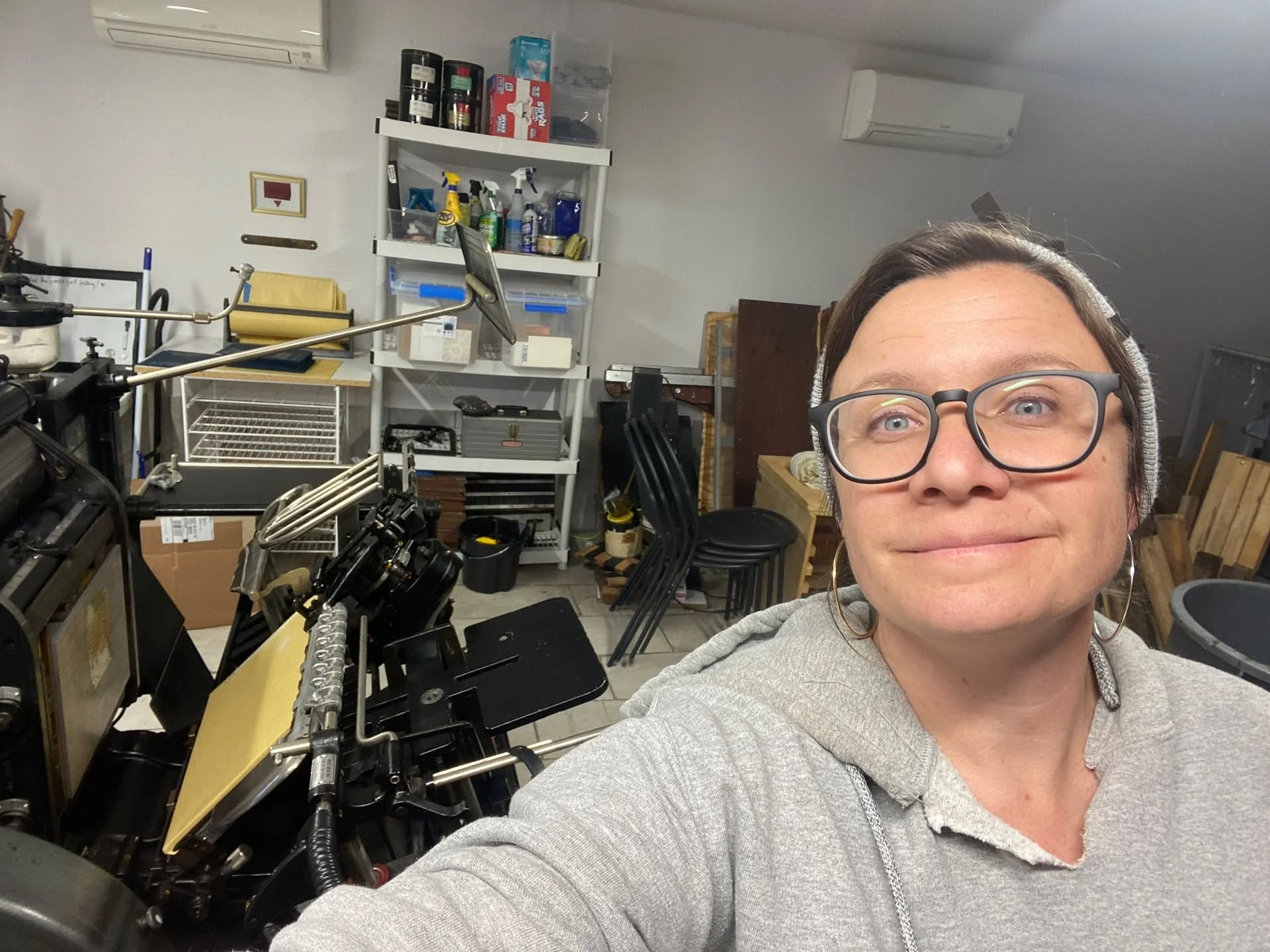 portrait of a very tired printmaker. i have been working so hard printing for holiday markets and sales and wholesale, and i am both so *incredibly* grateful that people continue to resonate with and want my work - and also, i am so tired, y'all. all