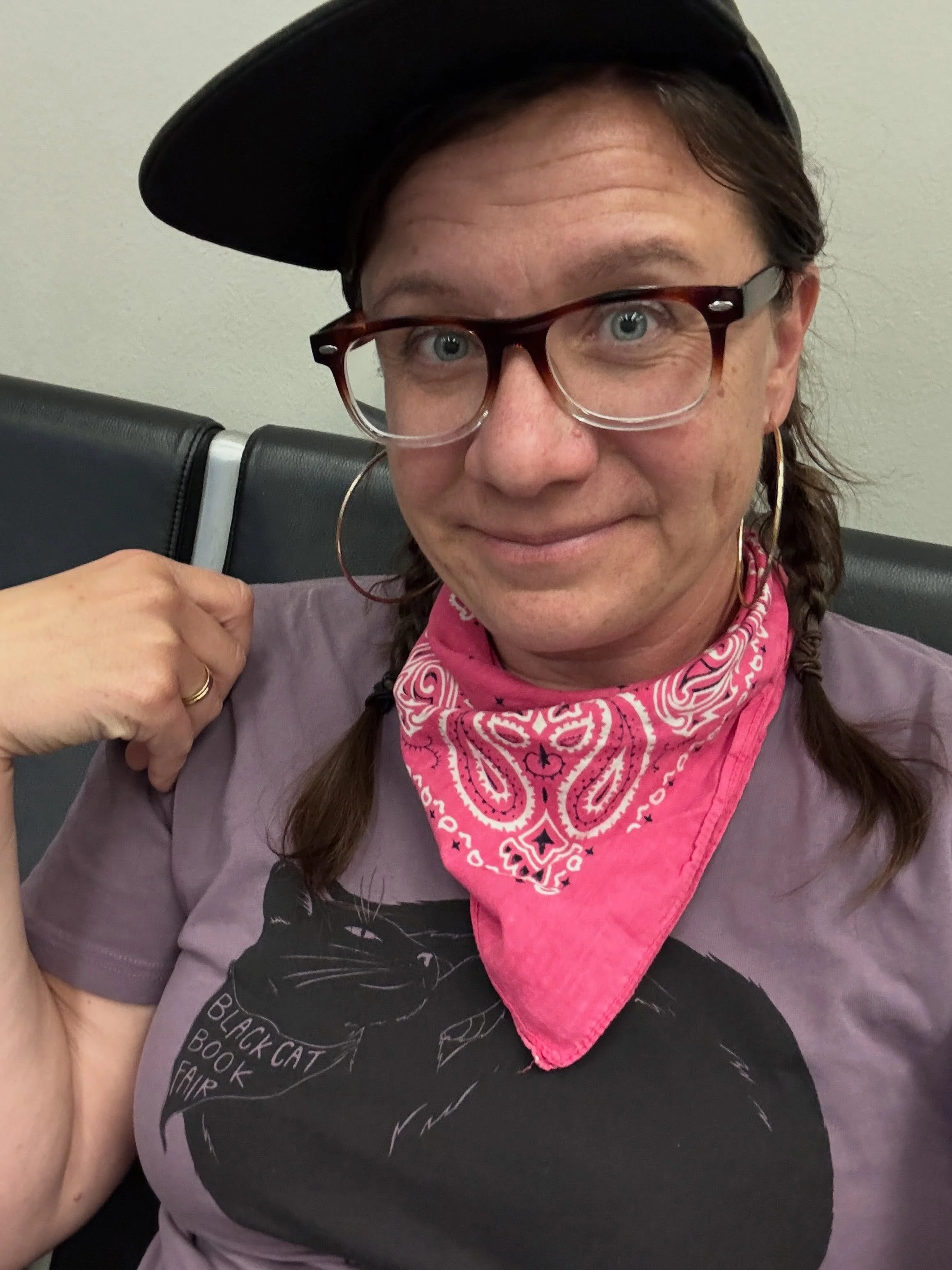Back in the airport to head home for the @blackcatbookfair tomorrow 11-6 and Sunday 1-5! (And even wearing my shirt from last year! 😂) Looking forward to seeing y&rsquo;all and slinging prints! I&rsquo;ll have all the prints &amp; stickers in this d