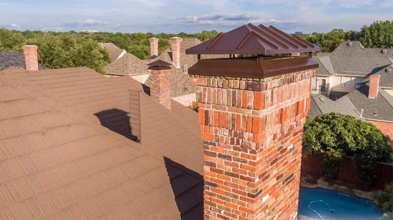 Chimney cap installed on a brick chimney in Celina, Texas — protecting the flue from rain, animals, and debris
