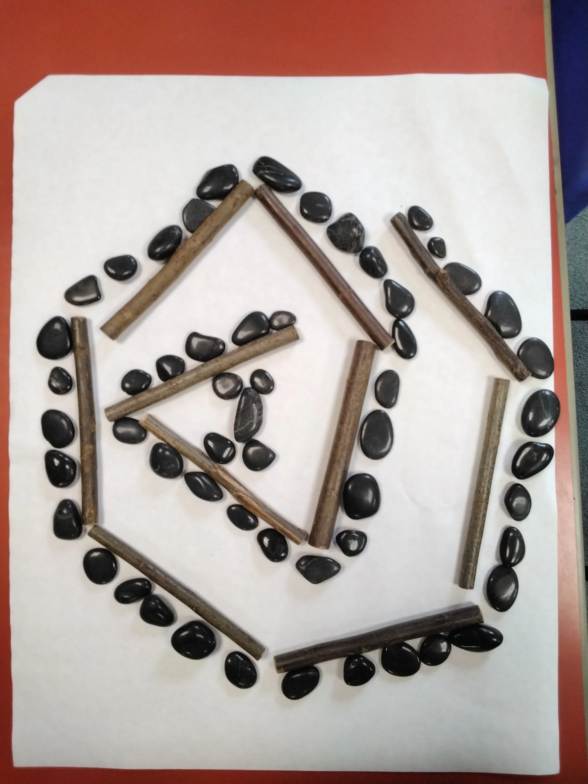 We explored the sculpture of Andy Goldsworthy by making our own Land Art using natural resources in collage. 