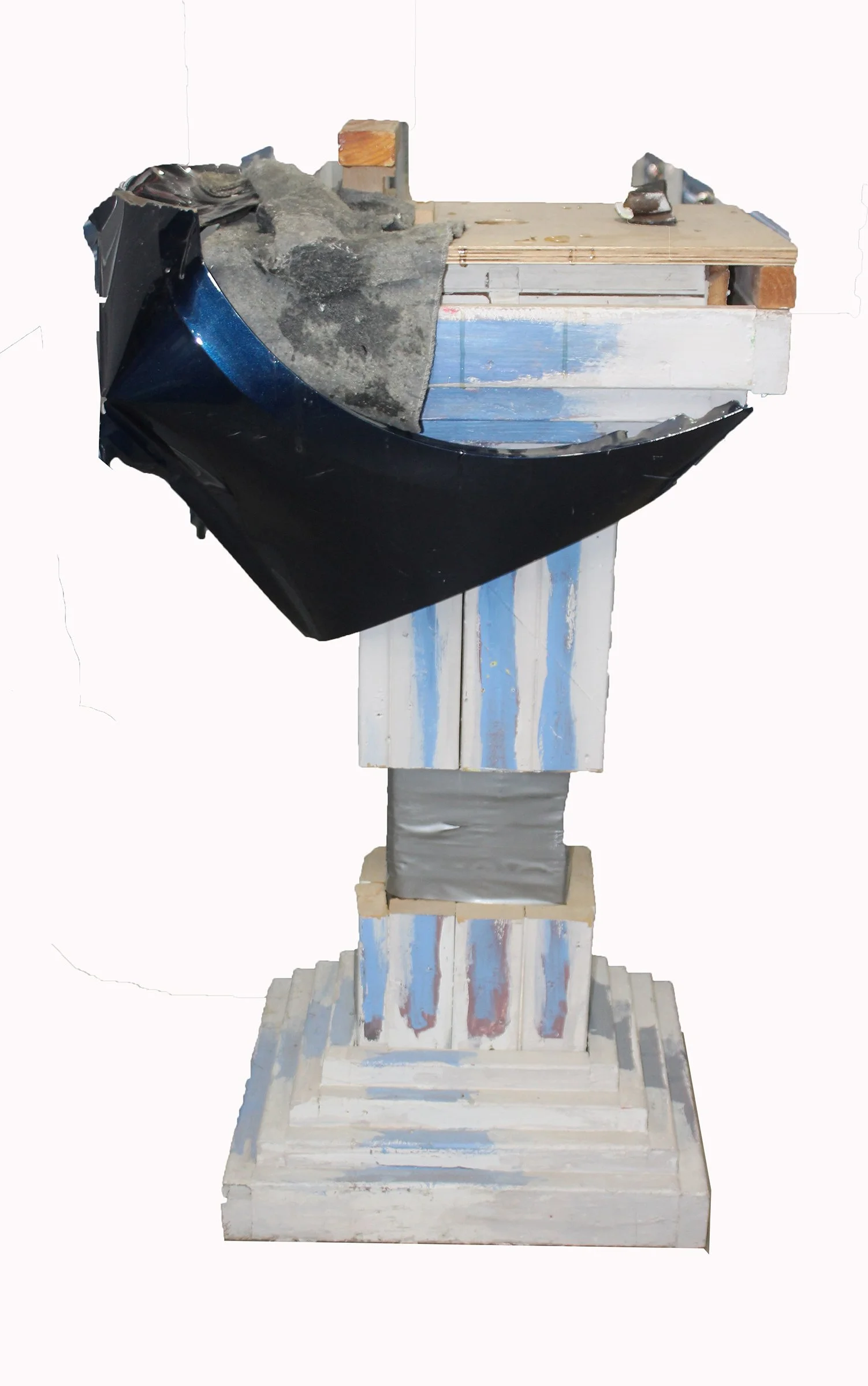 The Grand Iconoclast
wood, car fender, duct tape, moving blanket, resin, part of sneaker shoe
54" x 33" x 22" 2020