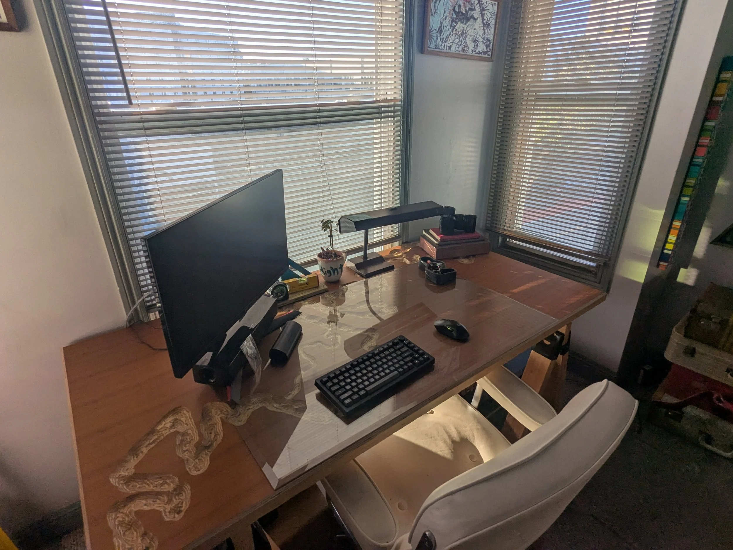 My desk, built from a 1" piece of marine grade plywood. I carved a river into it for Local Language. However, given the complexity and cost we never made more than the prototype.