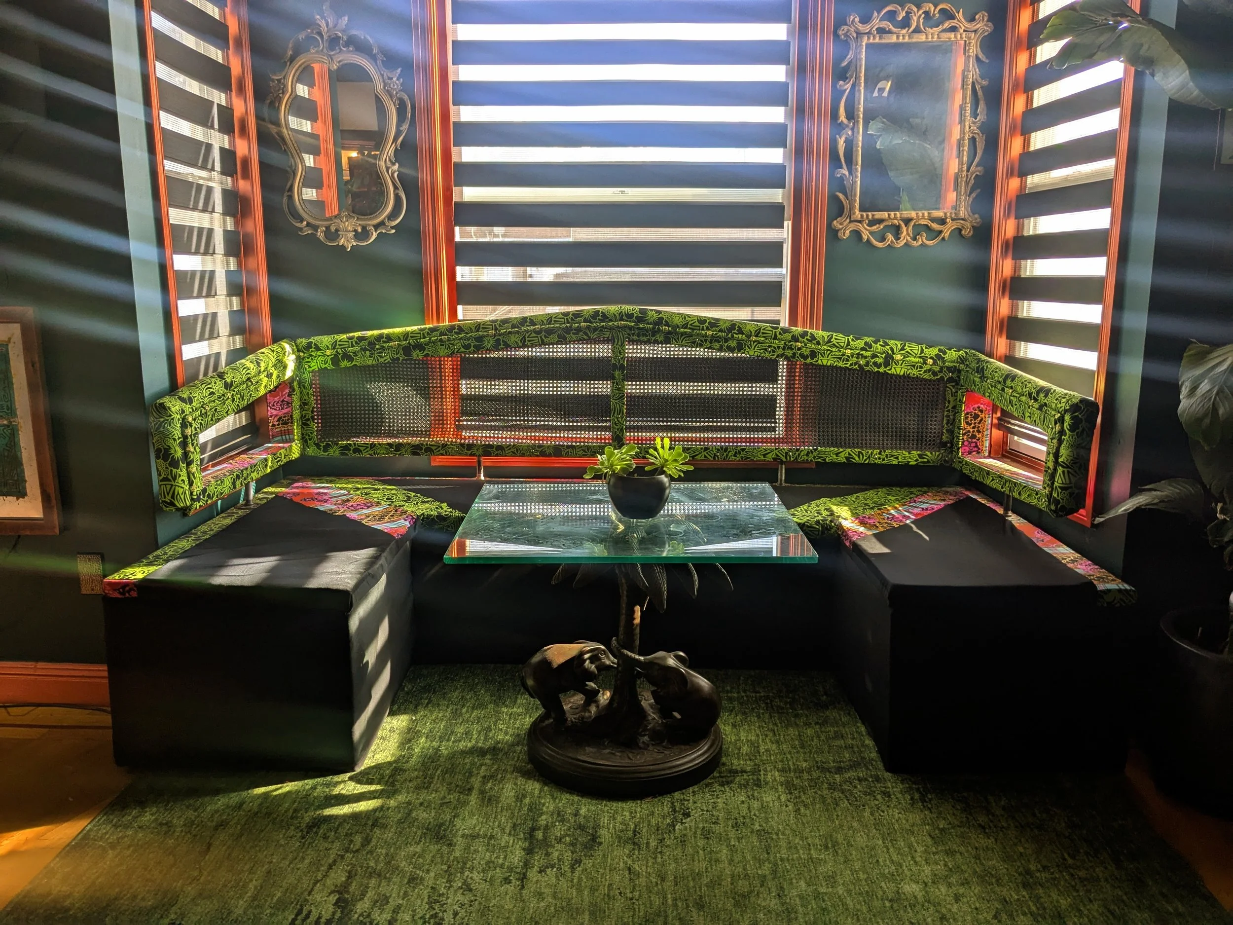 The booth - my own design. Upholstery by Matthew Allen Design. There's storage underneath, seats a 6 pretty comfortably.