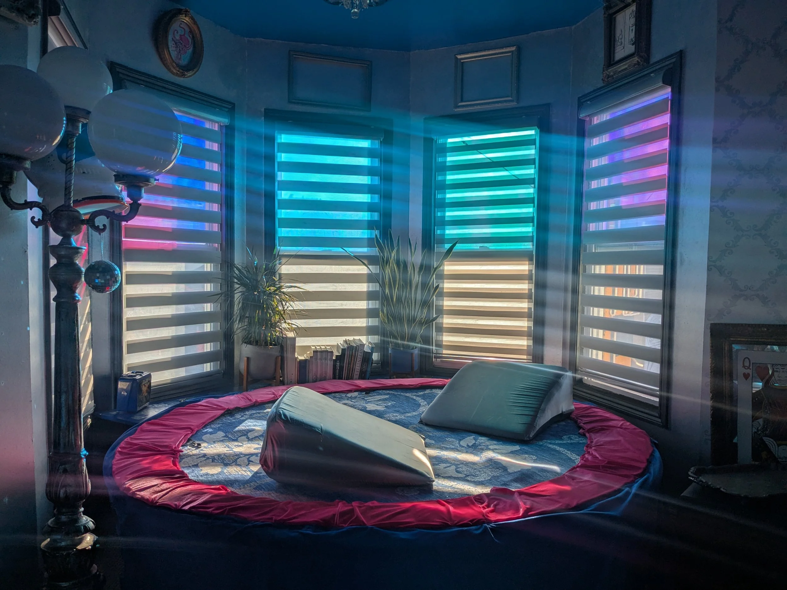 The trampoline! Yes I have an eight foot trampoline in my apartment. Yes, you can bounce on it. Its the chill spot in the apartment, where I can read and listen to music. The center channel is under the trampoline. I wanted a piece of furniture that