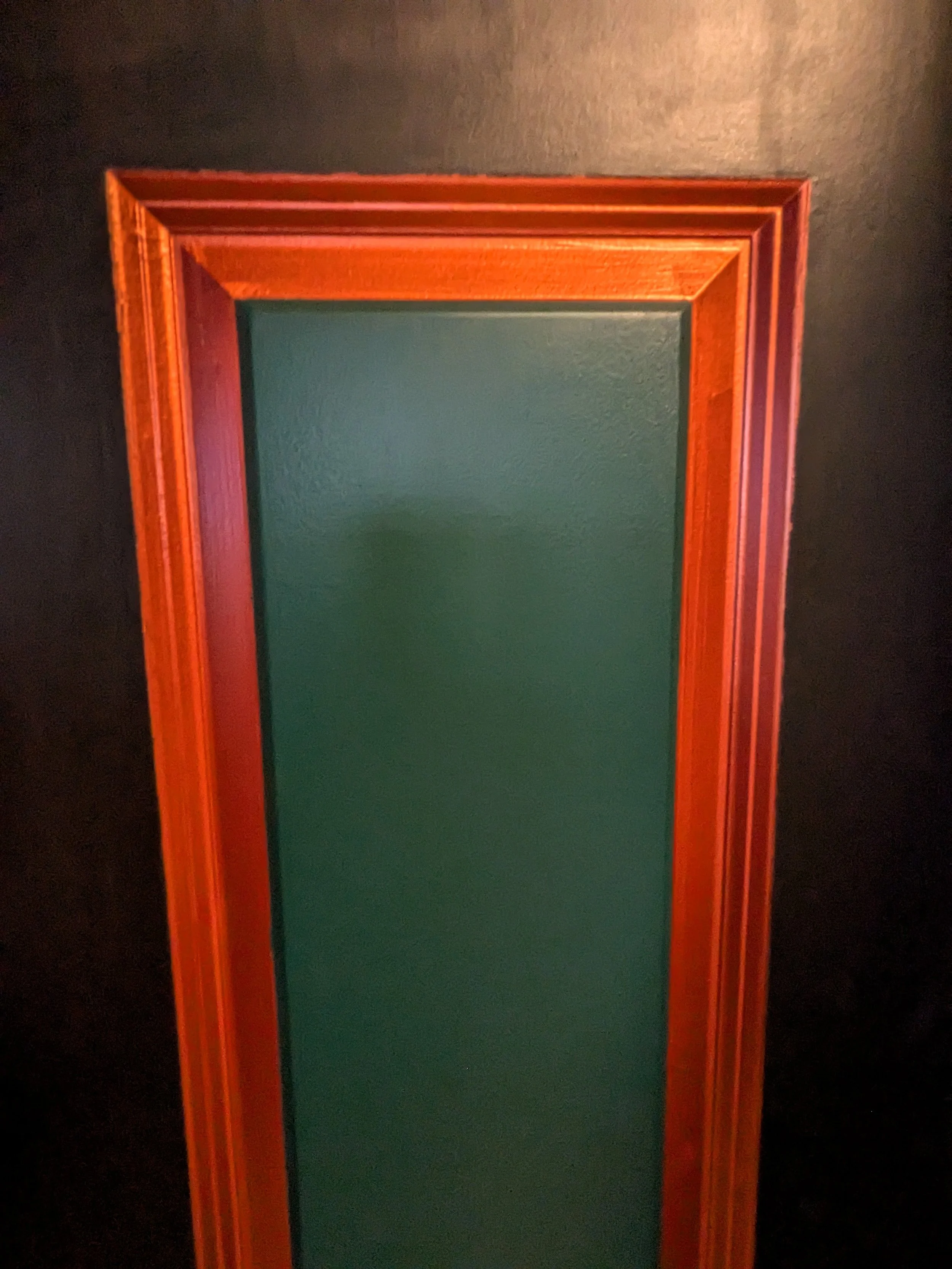 Close up of the door and paint colors. Tricorn Black, Copper Metallic, Country Squire Green