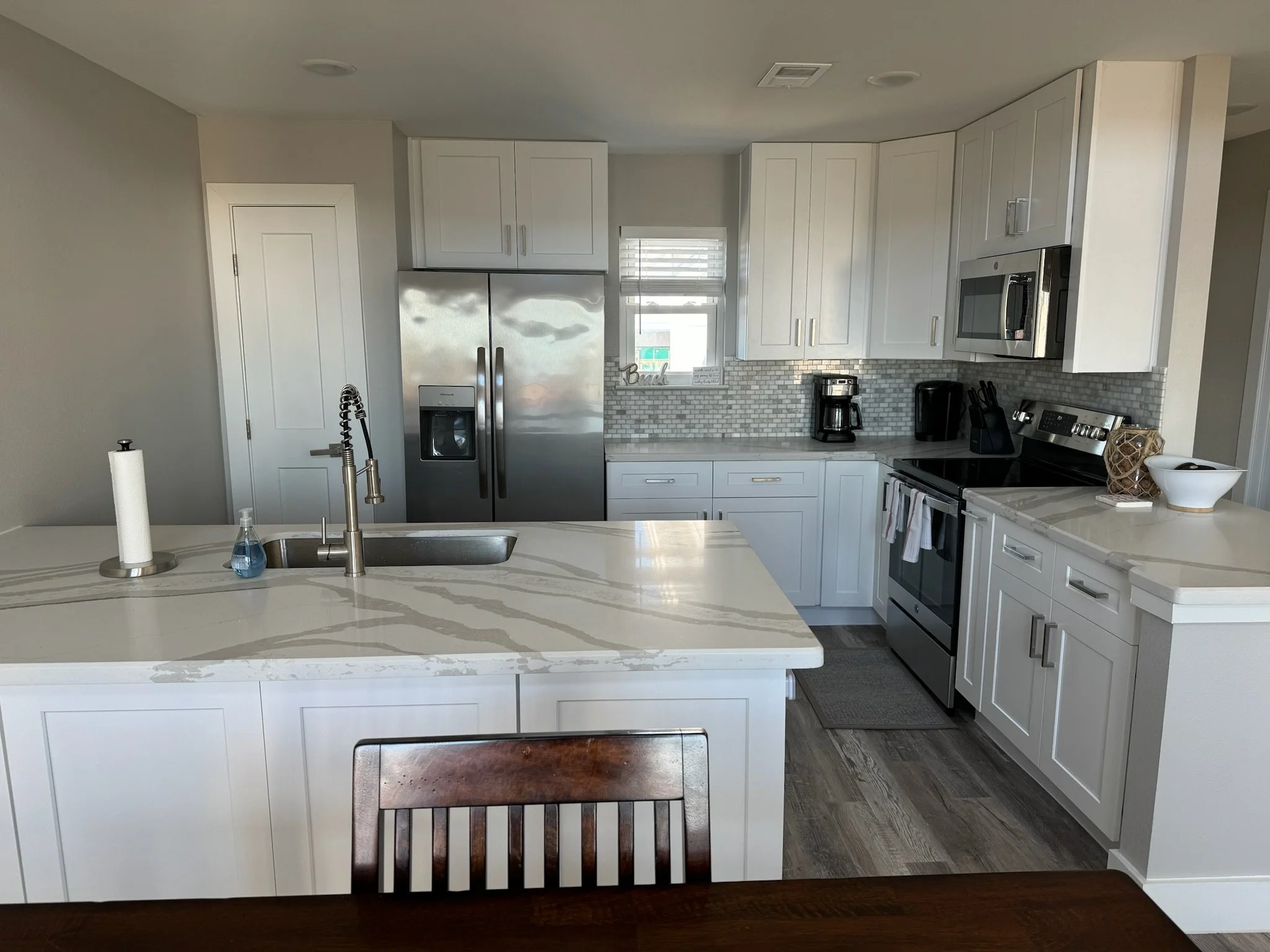 The kitchen is fully stocked! From pots and pans to baking sheets and a blender, you'll find everything you need to prepare a great meal! The pantry holds the Yeti backpack cooler and we have a traditional drip coffee maker and Keurig.