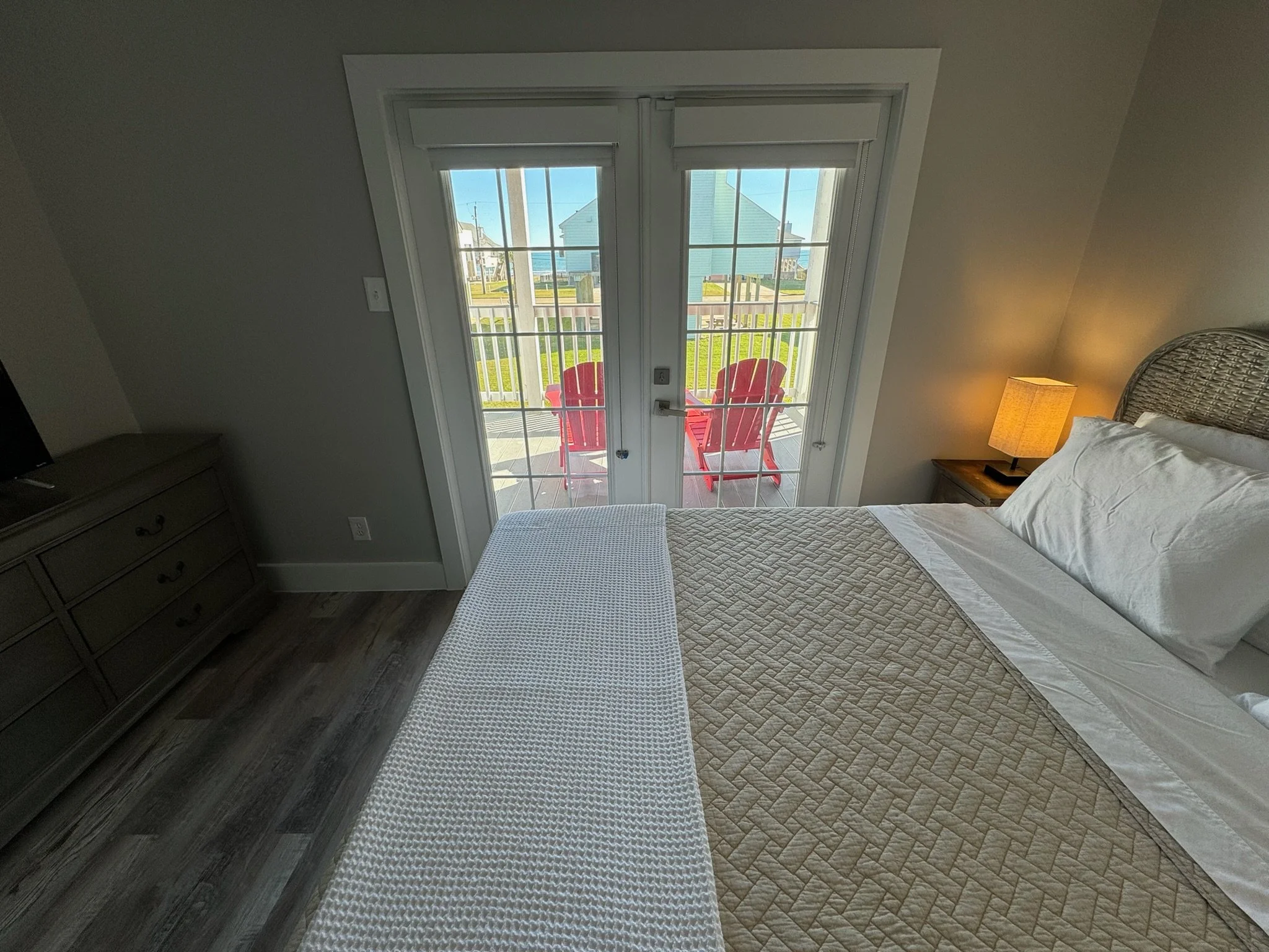 Deck access and a lovely view are yours in the secondary bedroom.