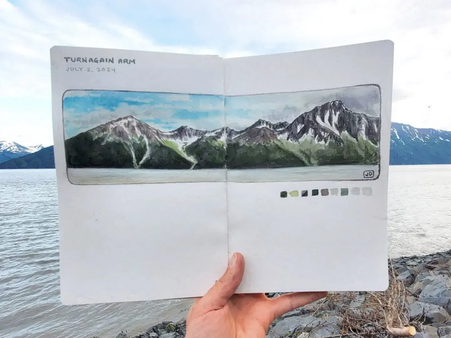It feels good to be back outside with a sketch book. This is one of many stunning views along the Turnagain Arm. I even got to watch some beluga whales while painting!

#mountain #alaska #sketchbook