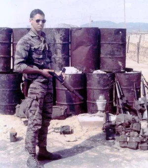 MACV-SOG+soldier+with+a+Sterling+sub-machinegun.webp