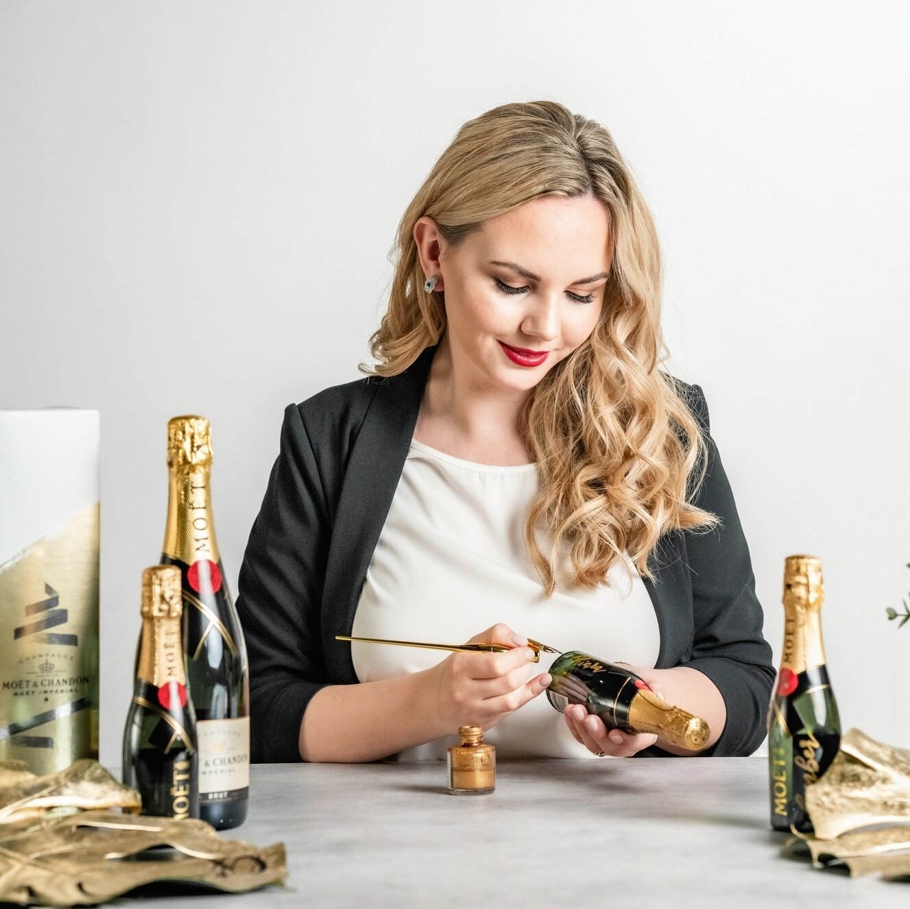 Personalizing Moet champagnes as PR gifts... Red lipstick matches the label design!⁠
.⁠
.⁠
.⁠
.⁠
.⁠
⁠
#copenhagencalligraphy #calligraphylover #k&oslash;benhavnkalligraphi #k&oslash;benhavnkalligraf #lettering #letteringart #letterings #letteringdail