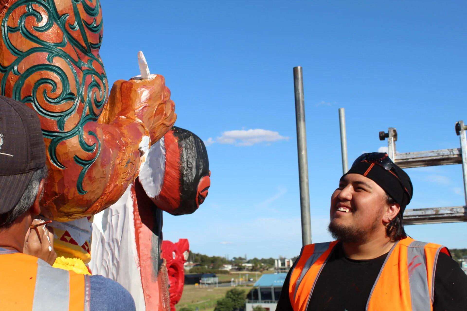 Tawhiri helping out with restoration of Kupe, at the top of the scaffold