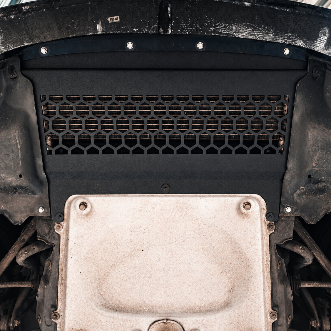 Gritty+Automotive+Undercarriage+Detail.png