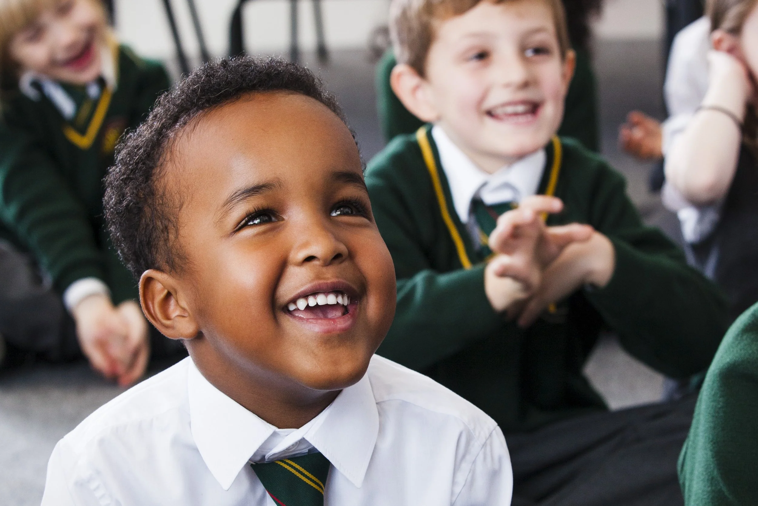 smiling-portrait-of-boy-in-a-classroom-by-alexander-caminada-photography-13952-079.jpg