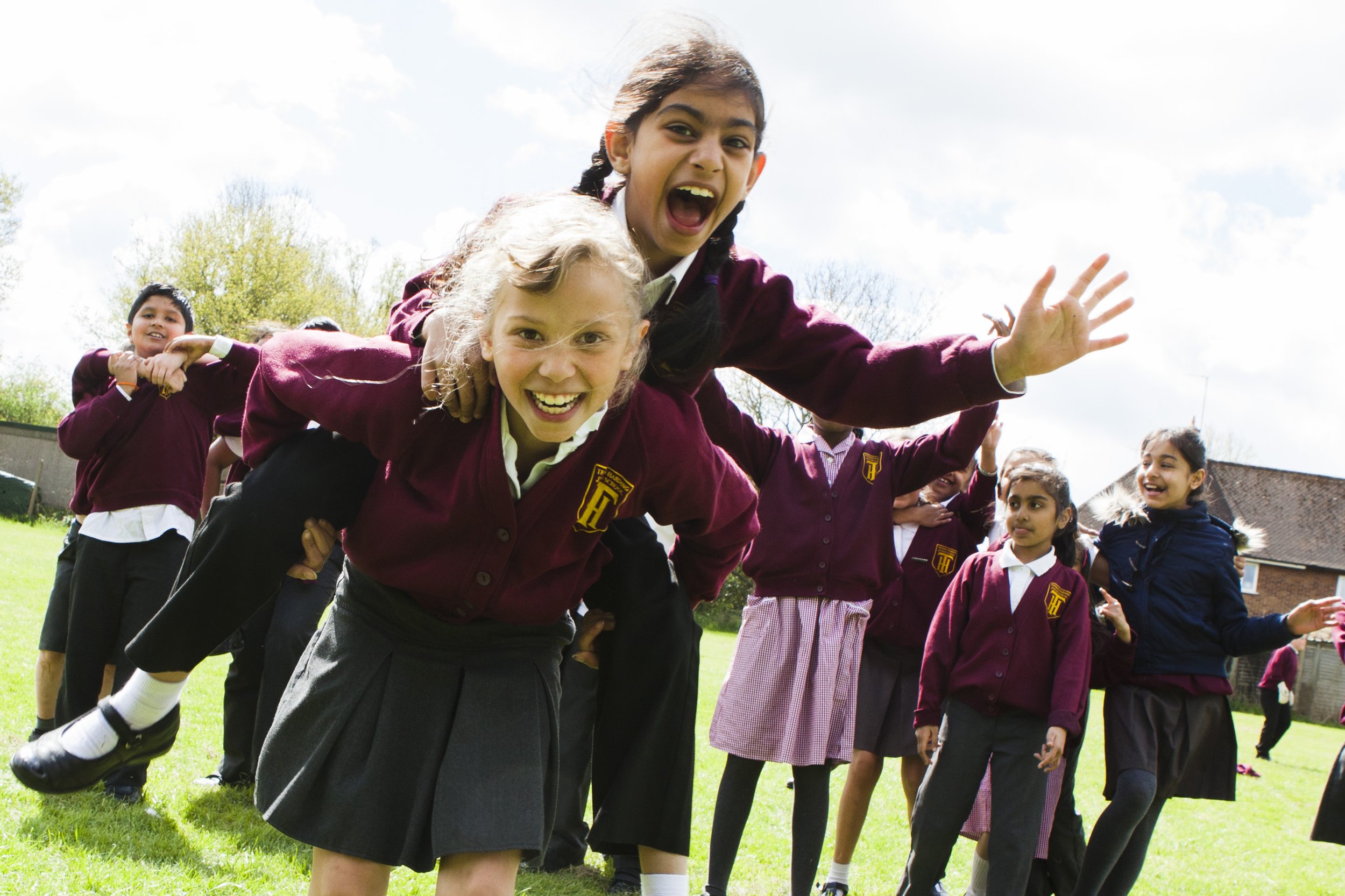 two-school-girls-laughing-outdoors-by-alexander-caminada-photography-14008-095.jpg