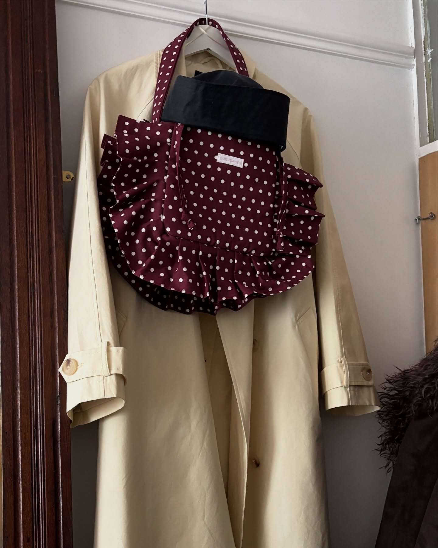 Trench coat buttoned to the top 🧥 shoot prep and location 🤍