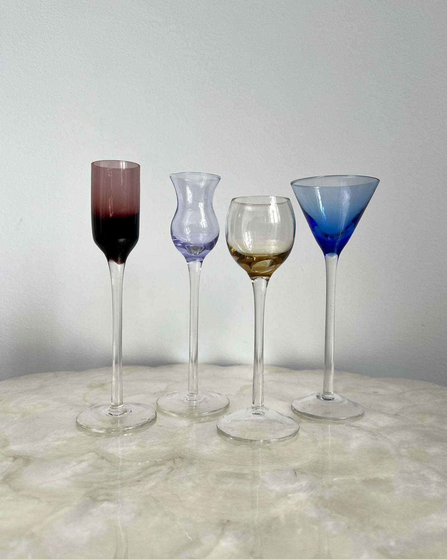 A set of cordial glasses in different shapes and colors. Quite a literal translation of jewel tones, ranging in blue Sapphire, purple Amethyst, lavender Quartz, and yellow Garnet. Set of four

D 2&rdquo; / H 6&rdquo;1 oz

&bull; Jewel Tone Long Stemm