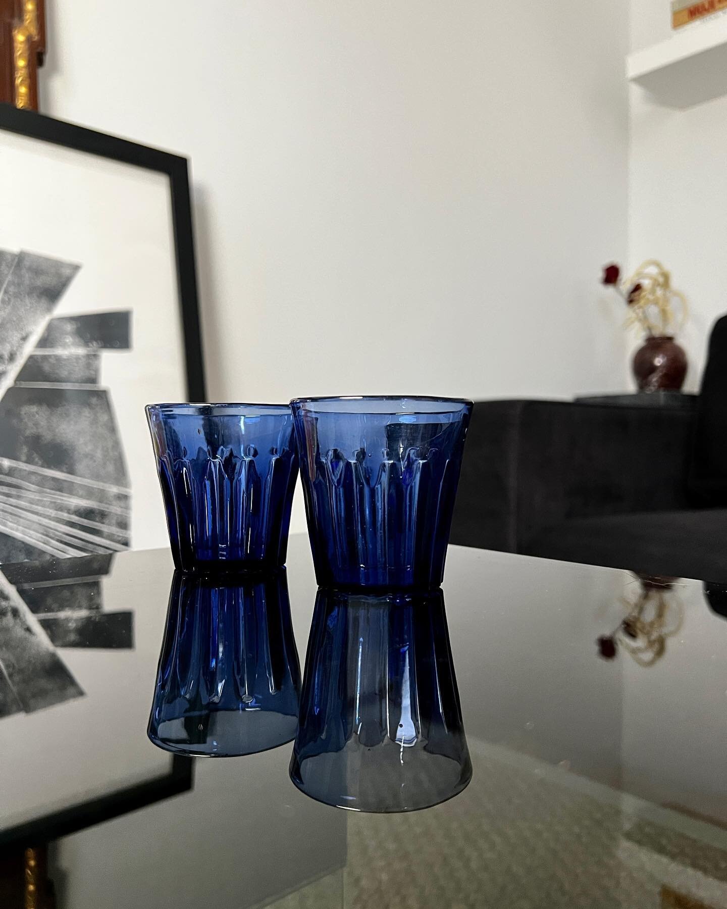 A pair of blue juice cups from the 1960s with a scalloped base. These glasses are a beauty to behold from all angles, including the bottom-up. Set of two

D 2.5&rdquo; / H 2.75&rdquo;
4 oz

&bull; Blue Scalloped Rocks Glasses Set &bull; $22

For more