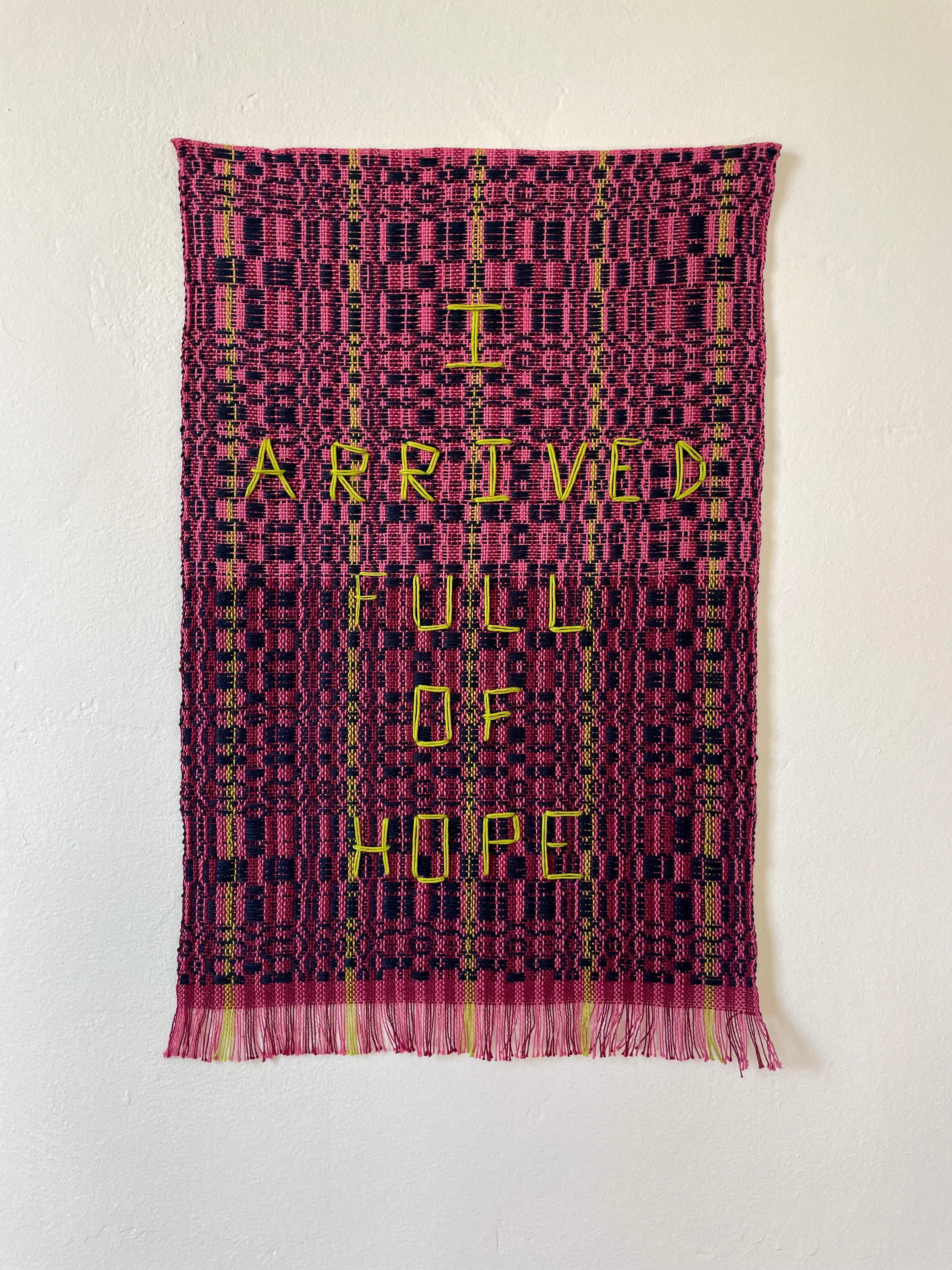 'I arrived full of hope' wall hanging