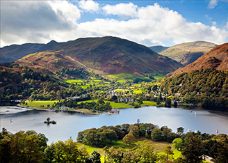 View over Ullswater reservoir towards the Inn on the Lake Hotel, location for IzzoSew Studio's Lake District Sewing Retreats