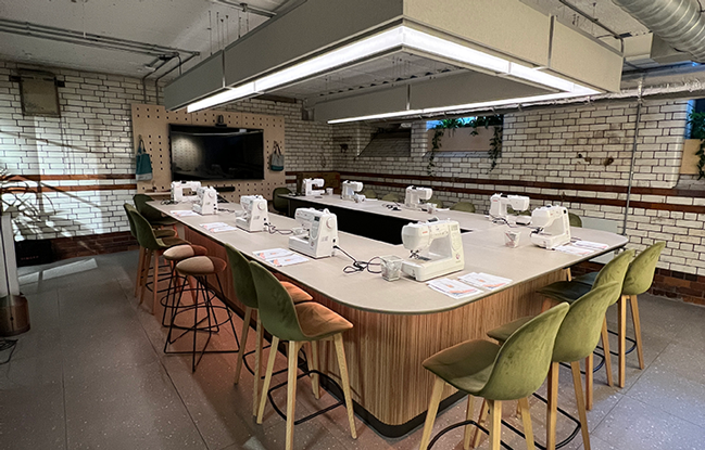 Sewing machines set up for a workshop in an industrial setting
