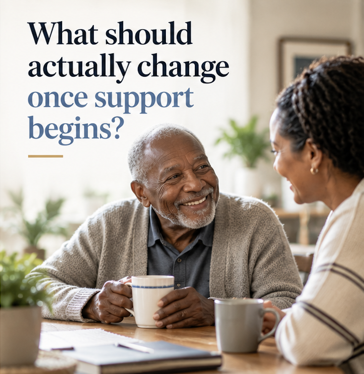 Older man having a conversation at home about support and everyday routines.