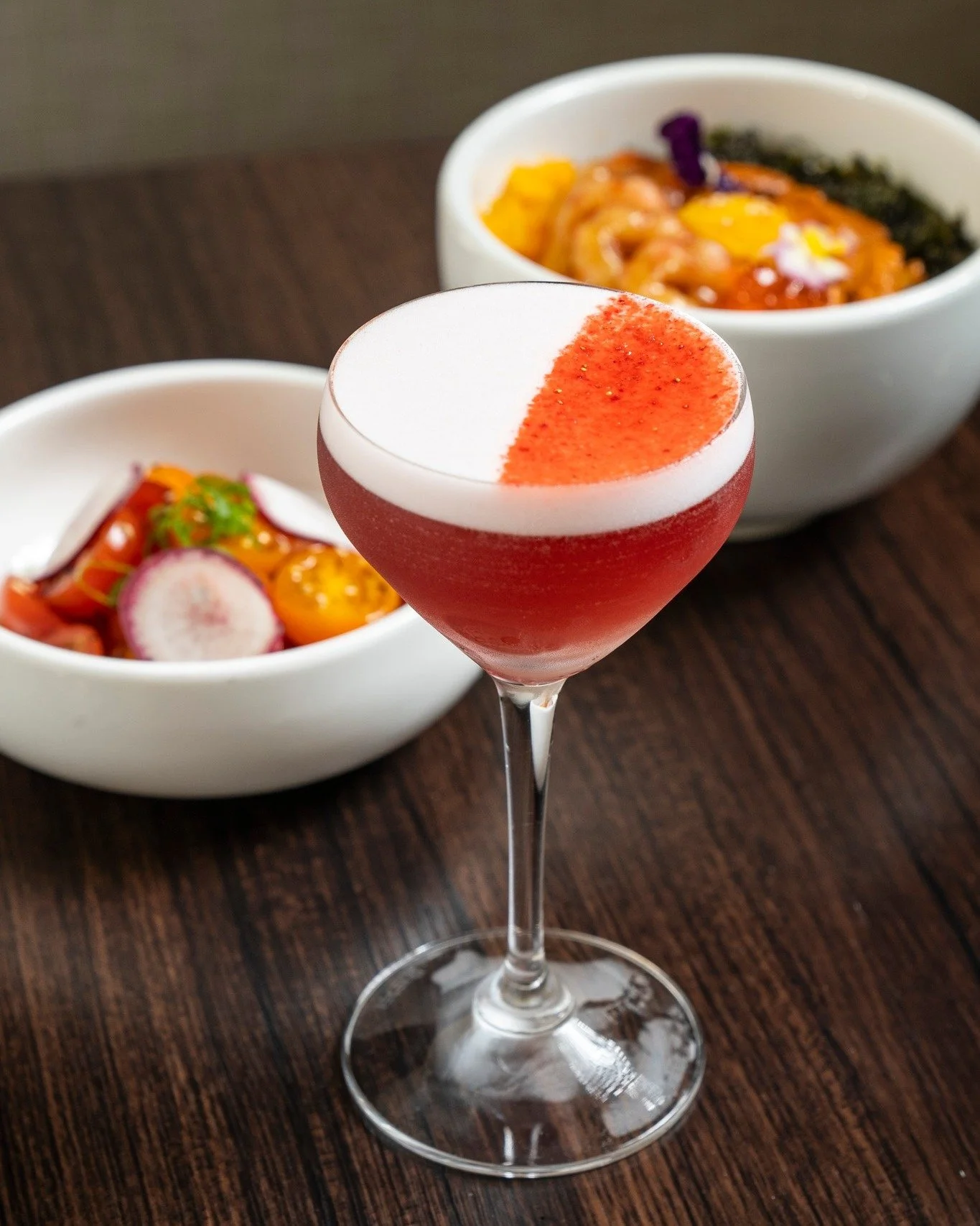 Have a sip of fruity flavor with our Sweet Rain cocktail. 🍓 Made with soju, strawberry, elderflower, lime, egg white, &amp; bokbunja -a Korean fruit wine- this drink is the perfect accompaniment to your savory meal. 

#DanbiExperience #cocktails #Ta